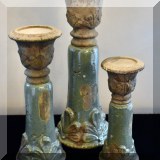 D12. Set of three ceramic candle pillars. 